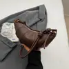 Bolso de mujer con acabado mate transfronterizo, modelo nuevo elegante y moderno, versátil para llevar al hombro, debajo del brazo y cruzado, bolso tipo 'dumpling' para el día a día