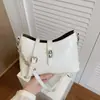 Bolsa de Marca Extranjera de Nicho para Mujer Modelo Nuevo 2026 Super Popular Bolso Cubo Acolchado con Cadena con un Toque de Alta Gama Versátil Bolso de Hombro y Cruzado