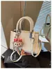 Bolsas Femininas Tendência de Nicho 2026 Nova Moda Primavera/Verão Bolsa Transversal Texturizada Bolsa de Mão Quadrada Pequena Super Popular