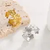 Anillo de titanio y acero europeo y americano transfronterizo para mujer flor acero inoxidable anillo abierto para dedo temperamento nicho simple pequeña margarita flor de cerezo