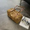 Bolsa Boston de Poá com Design de Nicho Coreano para Axila 2026 Nova Versátil Casual Sensação de Luxo Bolsa de Mão com Alça de Ombro