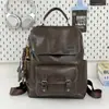 Mochila retro estilo británico con tapa abatible para pareja, adecuada para estudiantes universitarios, para llevar laptops y libros a clase, y para ir al trabajo o para viajes cortos.