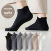 Meias Shield montanha masculinas de cano médio outono e inverno Novo preto cor sólida algodão meias masculinas mercado atacadista