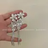 Diseño de Nicho Metal Flor Borla Larga Estilo Dulce y Fresco Diseño Exagerado Elegante Pendientes de Gama Alta Pendientes Largos