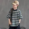 Nueva camiseta de manga corta a rayas para niño, estilo coreano, corte holgado, marca de moda, top casual versátil para niños mayores, ropa de verano de moda