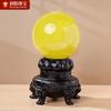 Fábrica atacado Mar da China Oriental bola de cristal amarelo natural redonda com base Home Office joias ornamentos decorativos