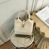 La popular bolsa pequeña explosiva de este año para mujer verano 2026 nuevo bolso de moda de un solo hombro cruzado bolso de cubo de mano transfronterizo