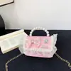 Nueva bolsa para niños bolsa de niña cadena de perlas bolso de mano moda estilo extranjero princesa hombro bandolera monedero