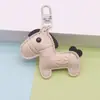 Pequeño y Exquisito Llavero Colgante Accesorio para Funda de Teléfono de Piel de Caballo en Relieve Colgante 3D Decoración del Año del Caballo