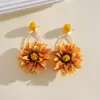 Pendientes de Acero con Flor de Tejido de Rafia Transfronterizos Europeos y Americanos Estilo Vacaciones en la Playa Pendientes de Moda Pendientes Personalizados de Alta Gama