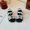 Sandalias para Niñas Estilo Coreano Moño Niña Pequeña Punta Abierta Zapatos de Playa 2026 Nuevo Verano Versátil Zapatos de Princesa