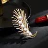 Nuevo Broche de Pluma Chapado en Cobre Dorado de Alta Calidad Corsage de Lujo para Mujer Moda Elegante Broche de Espiga de Trigo Perla Todo-partido Accesorios