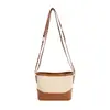 Bolso tote tipo cubo de lujo estilo francés al por mayor para mujer, nueva colección otoño 2026, bolso de hombro con retazos tejidos, bolso cruzado para el día a día