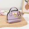Llavero de Mini Bolso de Concha de Moda Portátil Bolsa para Guardar Lápiz Labial Auriculares Colgante de Monedero de Mano