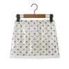 Moda europea y americana transfronteriza de Amazon para mujer, diseño sexy estilo francés, minifalda de lentejuelas con pantalones cortos integrados