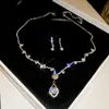 Set de collar y aretes geométricos con hojas adornadas con diamantes transfronterizo europeo y americano, cadena para la clavícula estilo vintage, joyería de alta gama de lujo ligero
