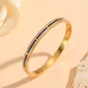 Versátil Transfronterizo Acero Inoxidable Electrochapado al Vacío Joyería Flor Pequeña Patrón de Ojo Varios Brazaletes para Mujer Brazaletes de Diamante