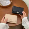 Nuevo diseño corto estilo coreano para mujer 70% de descuento billetera de moda primavera/verano multifuncional portátil tarjetero con múltiples ranuras para tarjetas