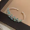 Pulsera nueva de cristal hueco estilo coreano, elegante y lujosa, sensación de alta gama, diseño de nicho, joyería versátil y de moda para mujer