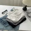 Camiseta básica de lana Tencel con borde crudo cosido, suave y amigable con la piel, para mujer, estilo de principios de otoño, camiseta de manga larga ligera y transpirable