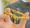 Pulsera de Cuerda Colorida con Patrón de Martillo Abundante Estrella Pepita de Oro Pequeña Color Dorado Arena Vietnamita Pulsera de Tubo Curvado Retorcido Estilo Francés Antiguo para Mujeres