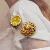 Botones estilo Chanel de gota de aceite con cabeza de león en relieve francés para cárdigans de punto y abrigos, botones metálicos de alta gama