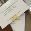Pendientes de lazo deslumbrantes con baño de oro vietnamita, diseño de nicho simple y exquisito, pendientes de lujo ligero para mujer