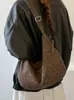 Bolso tote nuevo de estampado de leopardo Yuezhi 2026 para mujer, bolsa casual de gran capacidad para estudiantes, bolso versátil y moderno para el día a día