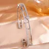 RAKOL Moda Luxo Leve Cobre Incrustado Zircônia Trevo de Quatro Folhas Aberto Ajustável Pulseira Feminina Nicho Toque de Alto Padrão Joia de Mão