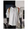 Camiseta de manga larga estilo americano con cuello Henry para hombre, nueva tendencia de principios de otoño para jóvenes, top holgado versátil para hombre al por mayor