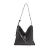 Bolso de cubo de alta gama transfronterizo para mujer, nuevo estilo 2026, bolso de mano de nicho con patrón de bambú, bolso de hombro elegante y versátil