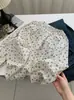 Camisa floral de cuello redondo con botones de concha, estilo pastoral suave, para mujer, principios de otoño 2026, blusa de manga larga abullonada de algodón puro, venta al por mayor