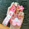 Chaveiro de Areia Líquida Infundida com Óleo Acrílico Transfronteiriço Criativo Chaveiro de Flor de Floco de Neve Pingente para Mochila Venda por Atacado
