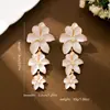 Brincos de Flor Gota de Óleo Moda Retro de Ponta de Nicho Mais Vendidos Transfronteiriços Adequados para Mulheres Usarem em Férias Diárias na Praia