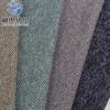 Aguja gruesa flor octagonal pequeña octagonal tweed otoño e invierno abrigo de traje para hombre y mujer abrigo imitación tweed tela de punto superior Lana