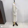 Ins Transfronterizo Europeo y Americano 2026 Nueva Moda Elegante para Mujer Venta al por Mayor Solapa Grande Transparente Sin Botones Gabardina Camisa Protectora Solar