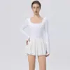 Macacão Esportivo Longo Europeu e Americano para Yoga com Bojo e Calça Forrada para Evitar Exposição Saia Evasê Vestido de Tênis