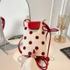 Bolso de teléfono de lunares de venta caliente transfronterizo, nueva moda de verano 2026, simple y versátil, sensación de alta gama, bolso de hombro cruzado