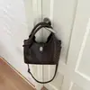 Bolso de mano vintage texturizado de nicho, bolso tote pequeño para mujer, nuevo modelo 2026, bolso tipo cubo simple, bolso de bandolera de moda