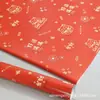 Gran celebración de Año Nuevo regalo regalo regalo caja de regalo papel de regalo rojo brillante empaque de flores papel de colores decorativo hecho a mano