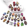 Zapatos de cueva de dibujos animados de superhéroes de Marvel, zapatos con hebilla de flor, zapatos de goma suave, accesorios para zapatos al por mayor, explosiones de Amazon