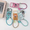 Corazón de lunares adecuado para funda de teléfono Apple 18promax iPhone17P soporte 16 con espejo 15P bolso