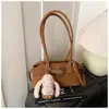 Bolsa Feminina Exquisita e Moderna 2026 Nova Inverno Simples Versátil Bolsa de Ombro com Toque de Luxo para Deslocamento Transfronteiriço