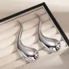 Pendientes Metálicos Exagerados de Forma Irregular de Gota de Agua Europeos y Americanos para Mujer Pendiente de Flor de Ola de Industria Pesada de Nicho Accesorio de Concha de Pulpo Venta al por Mayor