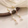 Pendientes de borla con imitación de perla en forma de cruz, versátiles para el verano, estilo suave para mujer, tachuelas, nueva joyería 2026