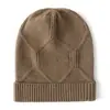 Nuevo gorro de punto de cachemira para Otoño e Invierno, mismo estilo para hombre y mujer, gorro de lana, moda simple, versátil, cálido, orejeras, gorro
