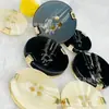 En stock botón de metal y resina de doble botón de cuatro ojales hebilla clásica para abrigo hebilla para camisa y traje hebilla de gemelos combinación de hebillas
