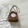Bolsa feminina muito estilosa e atraente, nova moda de verão 2026, bolsa de ombro e transversal, versão coreana, bolsa de mão única em formato de bolinho