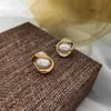 Clip para oreja de espiral para mosquitos de perla sin dolor para mujer, pendientes franceses, pendientes elegantes, retro, otoño e invierno 2023, nueva moda