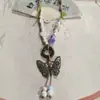 Collar con colgante de campana de mariposa de cerámica de estilo étnico retro para mujer, diseño nuevo y moderno, cadena larga para suéter, accesorios